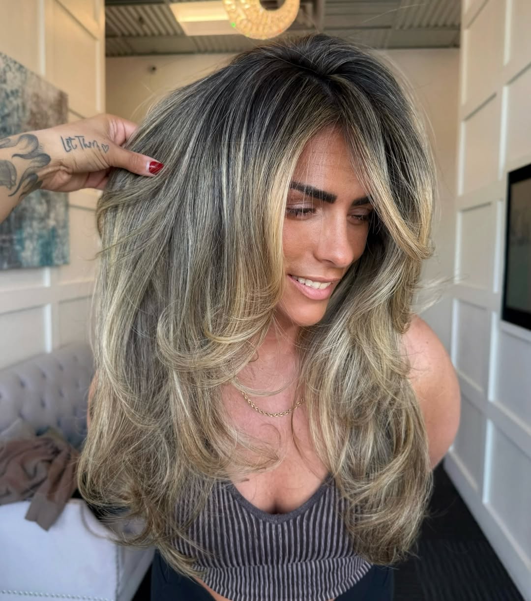 ✨🤍🫖 DIRTY CHAI BLONDE 🫖🤍✨

Like your favorite chai latte, but make it hair. 🫶🏼

• color @redkenpro @redken 
• styled with @milkshakehairpro @designmehair @alkalibeauty 
• tools @ergostylingtools @oliviagarden_int 

book with yours truly, link in bio 🤍
.
.
.
.
.
#blonde #highlights #teasylights #colorist #cthairstylist